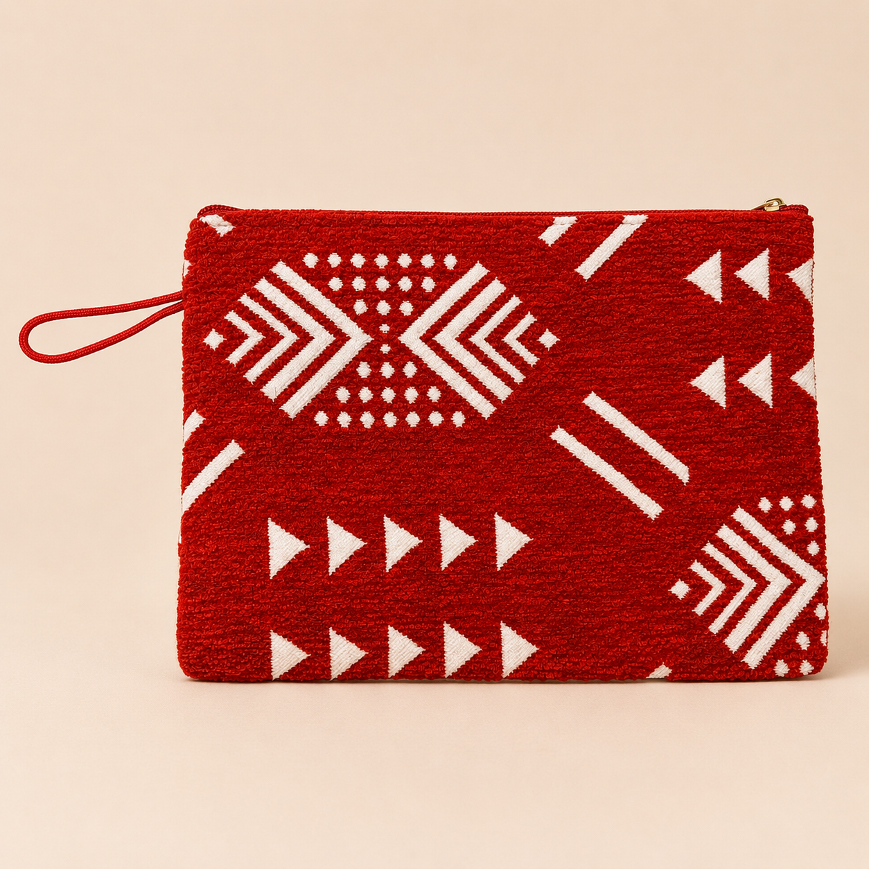 Pochette Bogolan rouge à motifs géométriques blancs